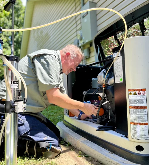Premier Generators factory-certified technicians performing generator installation